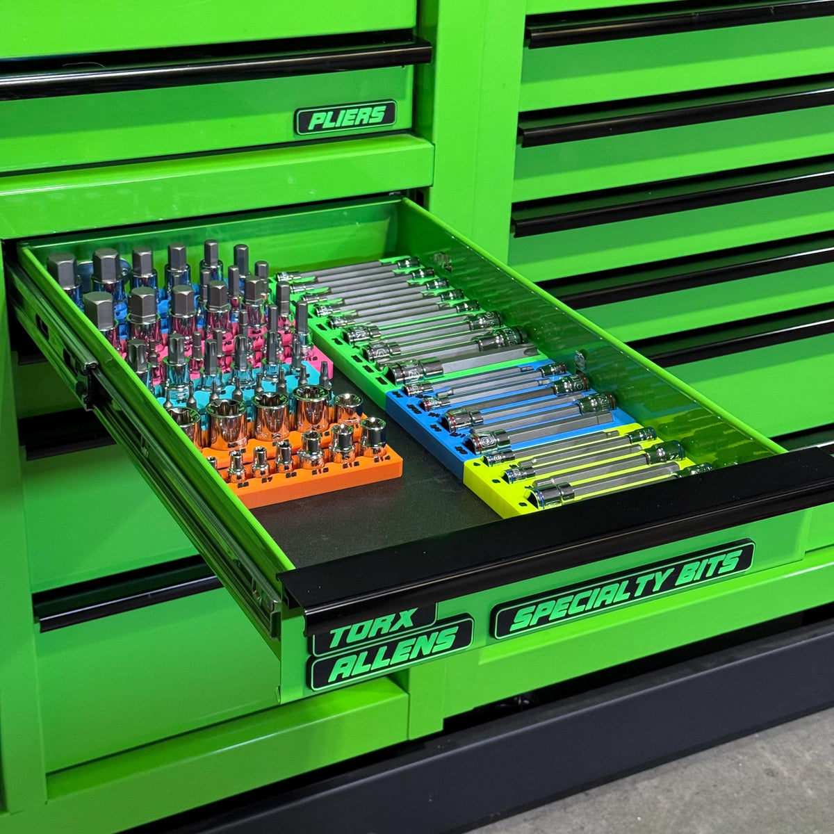 Quinn socket and bit groups organized in colored holders